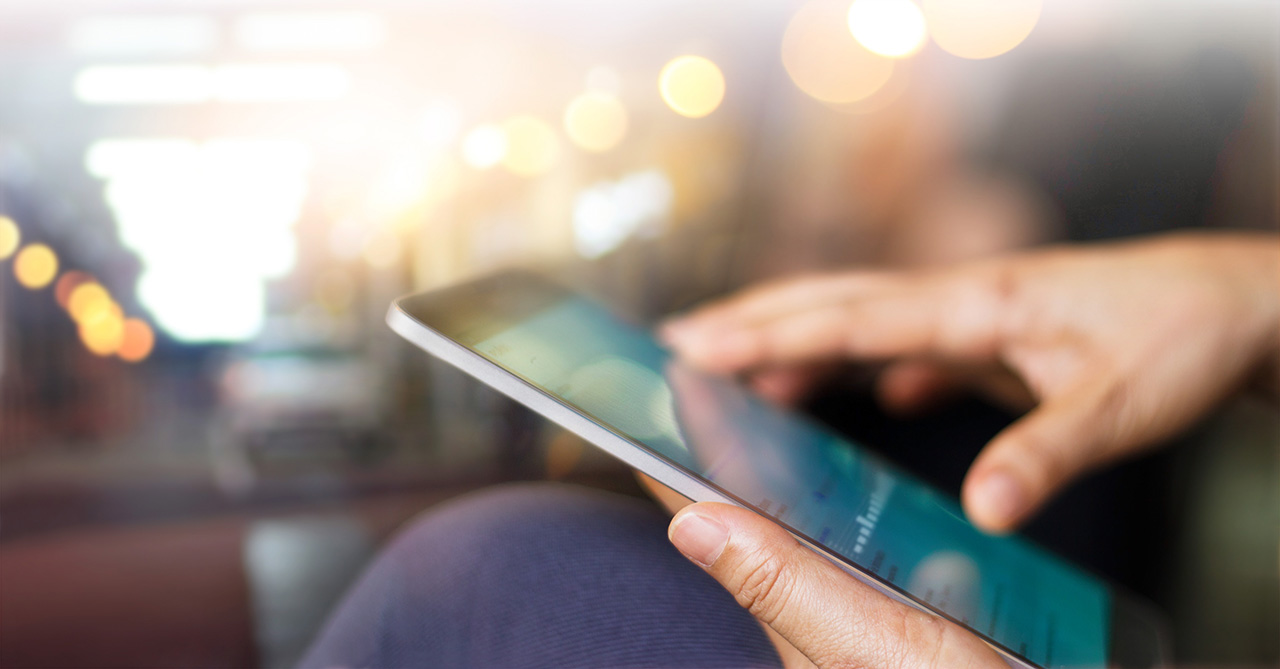 Businessman-using-tablet-at-night-time